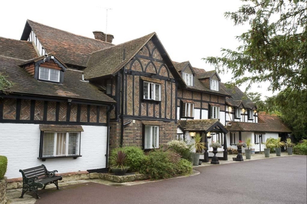 tudor style front of manor house