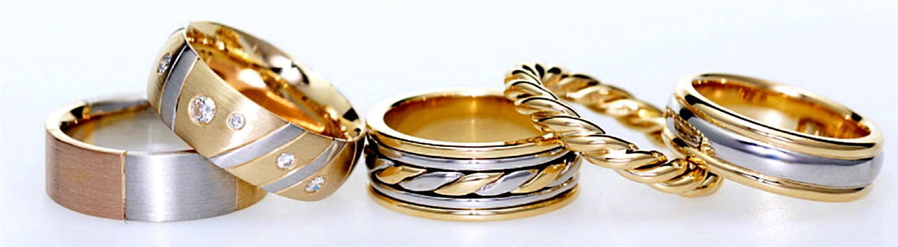 Five wedding rings by Aurum Designer Jewellers