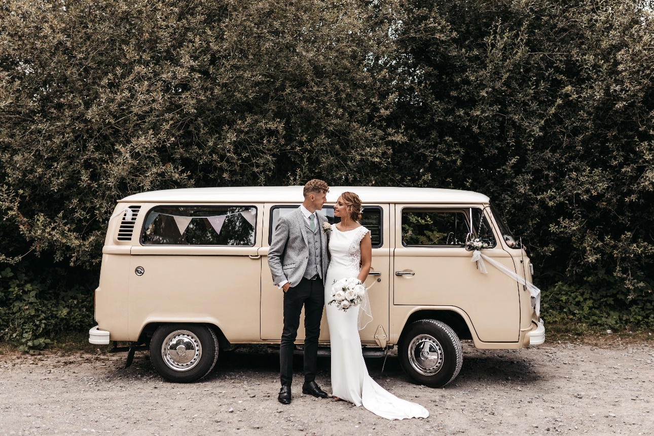 Couple infront of campervan