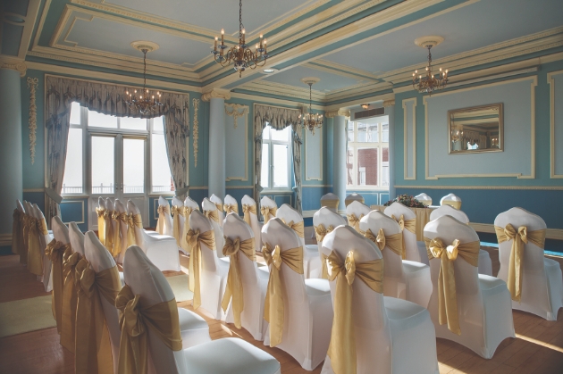 Hydro Hotel ceremony room chairs set up in a blue room facing the front