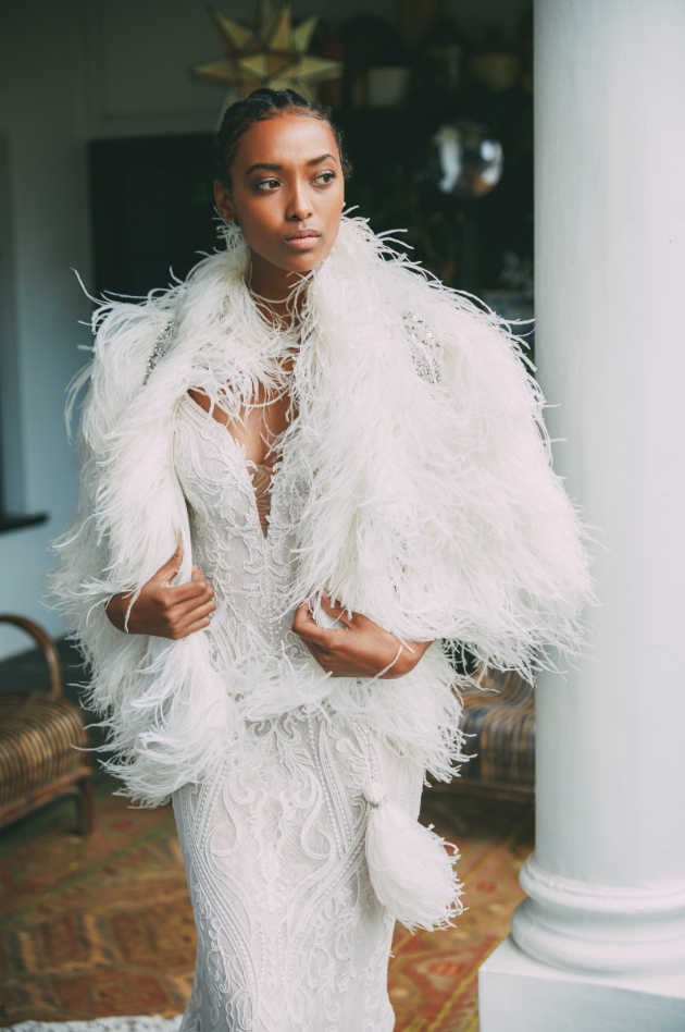 Bride wearing a larger feathered shawl from Anna Georgina 