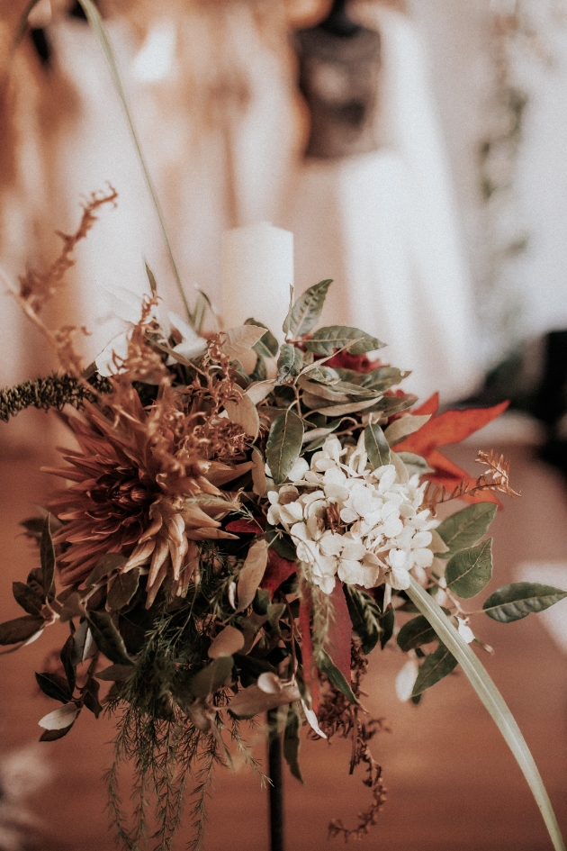 Autumnal flower arrangement including dried flowers