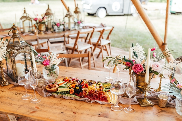 festival wedding reception layout with grazing table