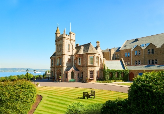 Culloden Estate & Spa, hotel on the lawn on the cliff edge coast inview