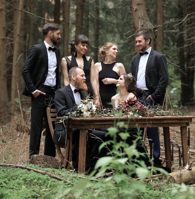 Black tie wedding in the woods.
