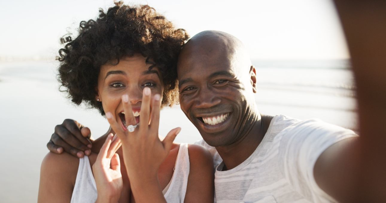 couple on beach engaged