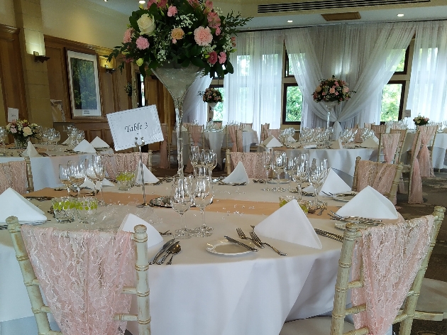 wedding reception with martini glass centrepieces