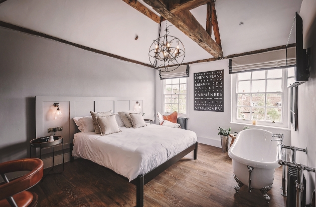 modern and rustic styled room with wood floors neutral colour palette but contemporary furnishings 