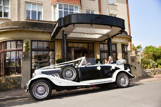 Exterior of Hydro Hotel in Eastbourne with a wedding car parked outside