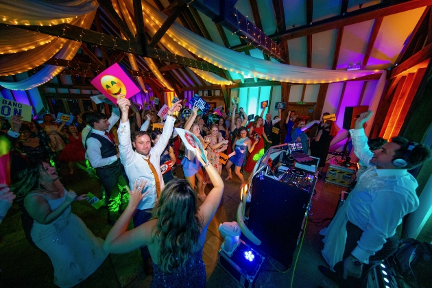 Wedding dancefloor full of guests having fun