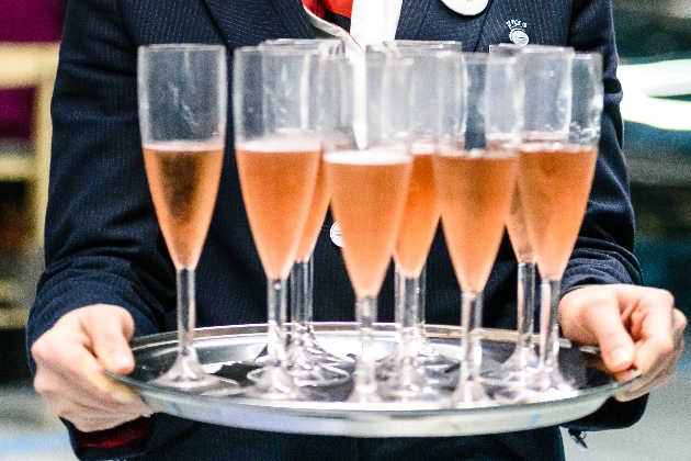 Nyetimber rose on a tray in champagne glasses