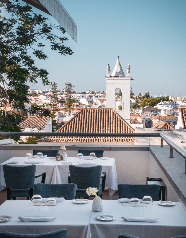 restaurant roof terrace with views of the top of the city