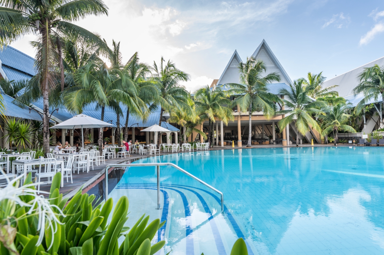 restaurant and hotel, pool side, parasols and chairs