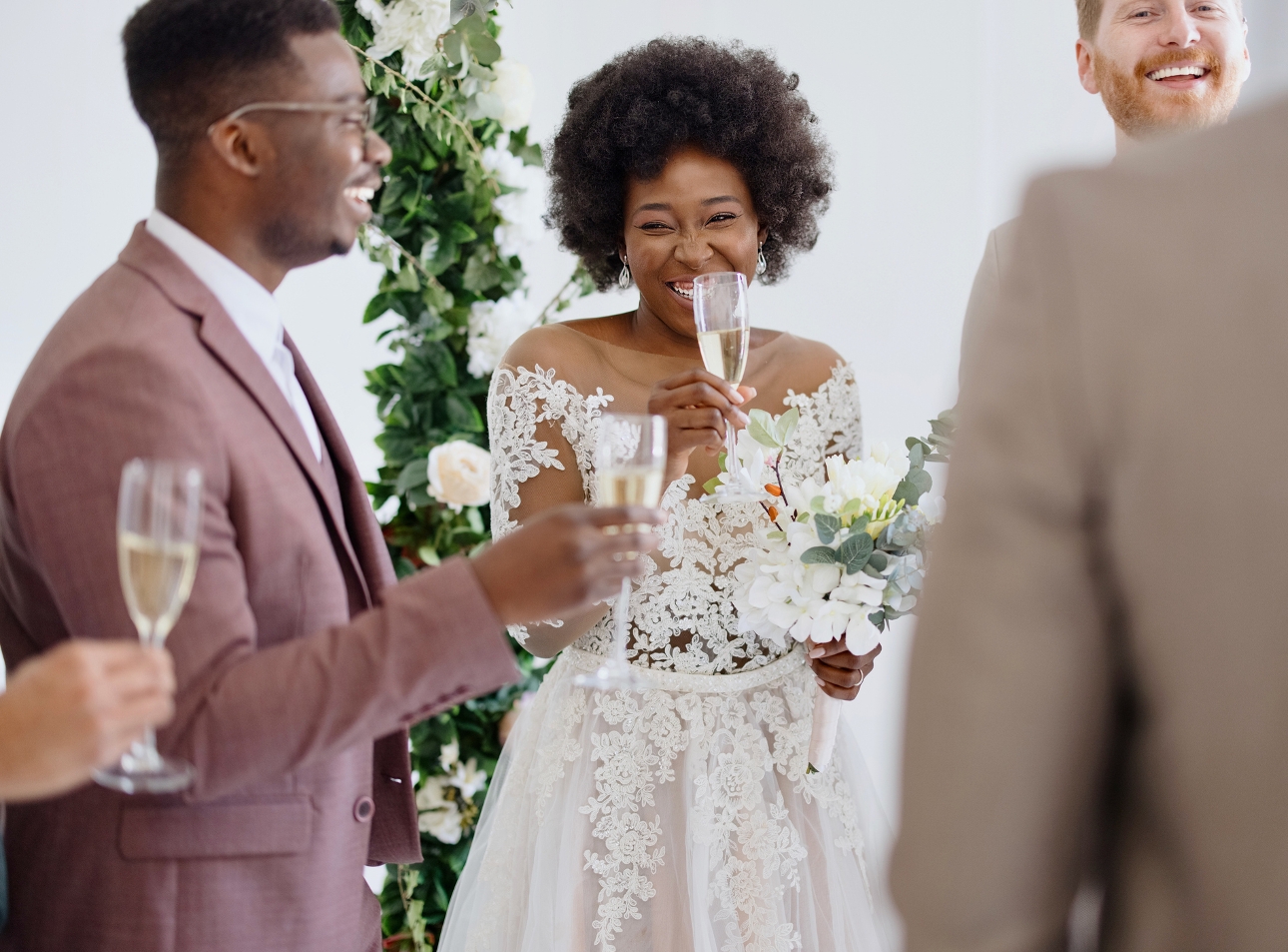 bride and groom just wedding and having a drink with guests