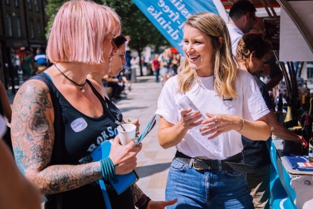 Women talking at a festival