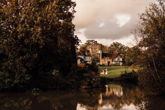 The Ravenswood from a distance with lake in foreground