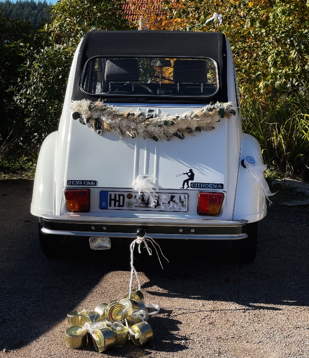 citroen 2cv in white with black top