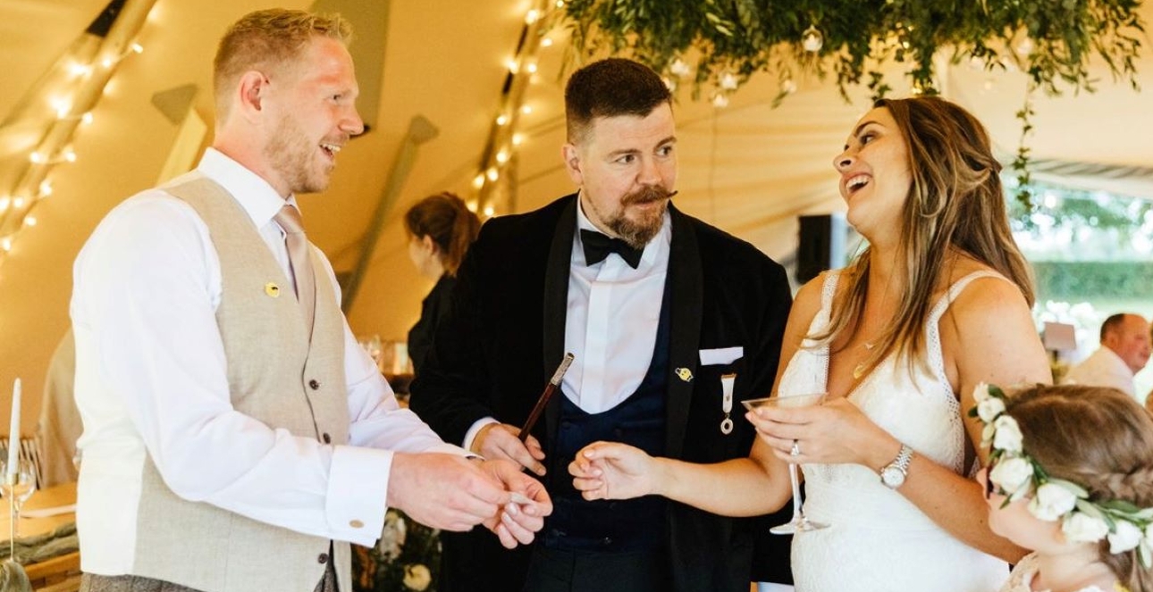 Close-up magic at a wedding with bride and groom