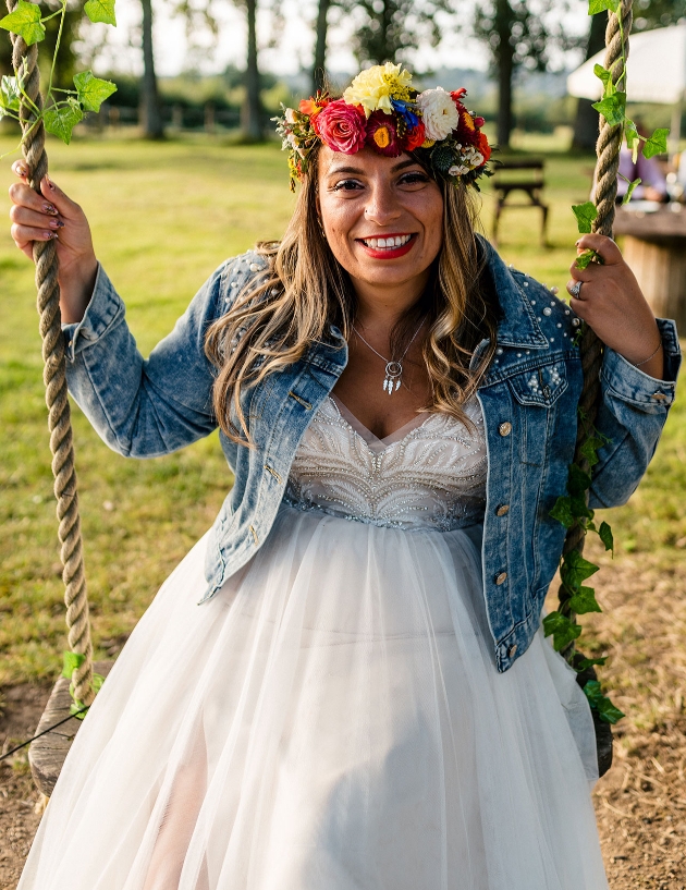 Bride sat on swing