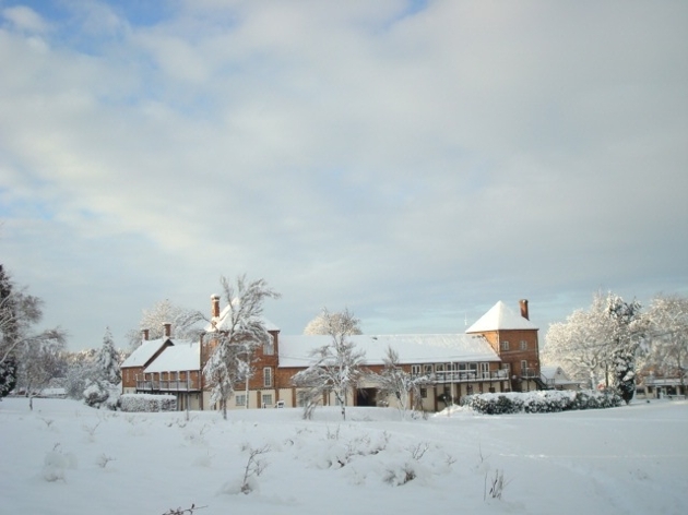 Cottesmore Hotel Golf and Country Club exterior covered in snow