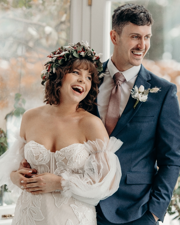 bride and groom laughing
