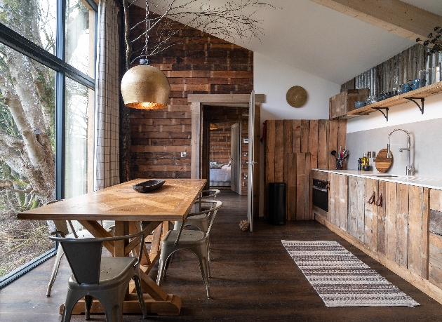 A kitchen/dining room at The Treehouses at Leckie