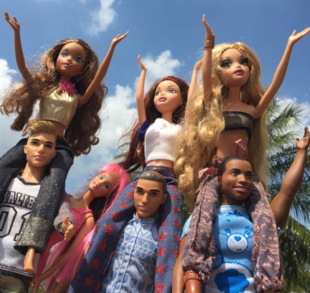 Barbies posed as though they're at a summer festival Leonardslee