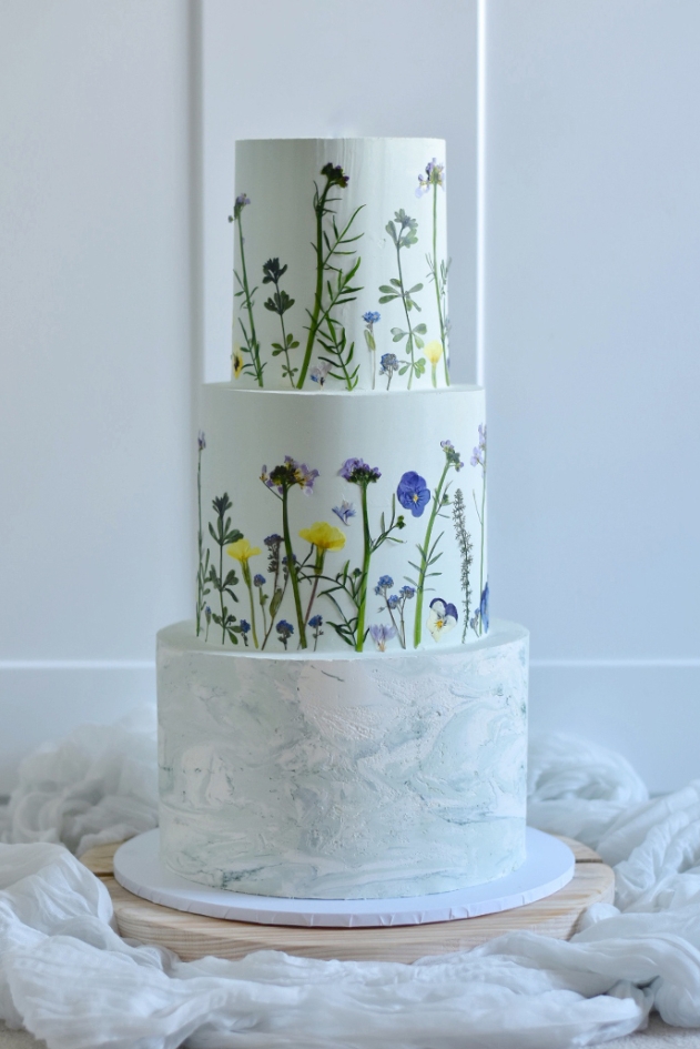 3 tier pressed flower and marble effect wedding cake by Emily's Mixing Bowl