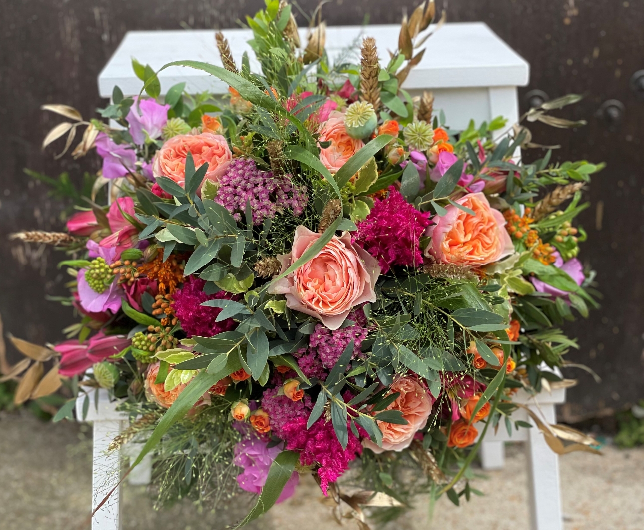 vibrant wedding bouquet by The Village Florist