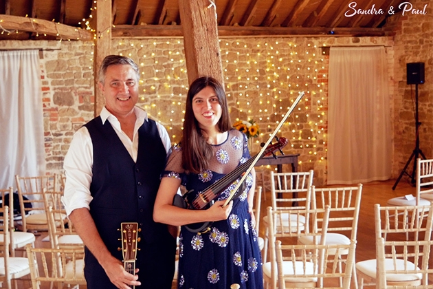 sandra and paul at a barn wedding reception