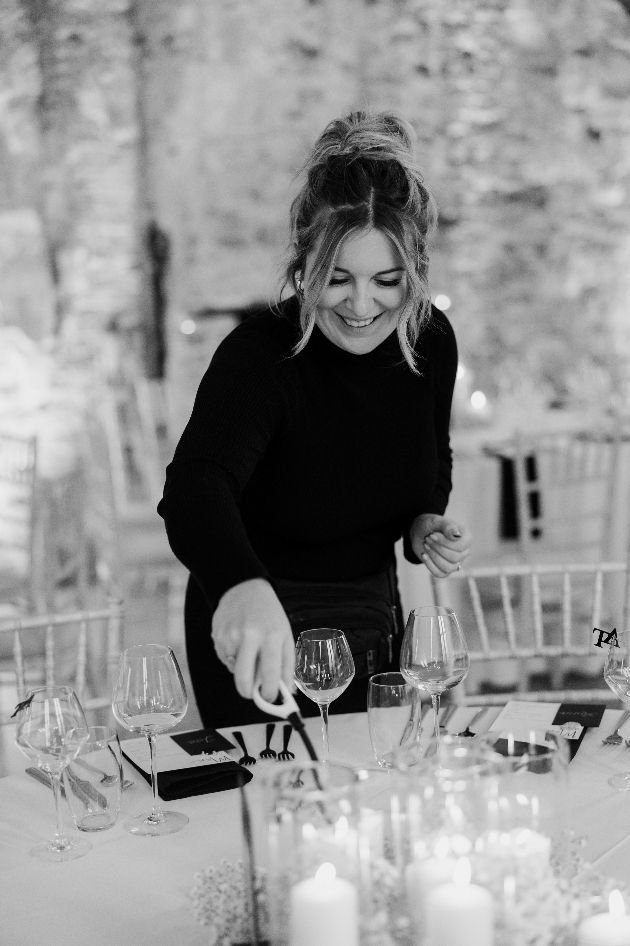 Georgie dressing a wedding table