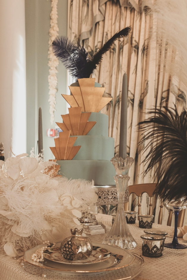 art deco style wedding cake in duck egg and gold