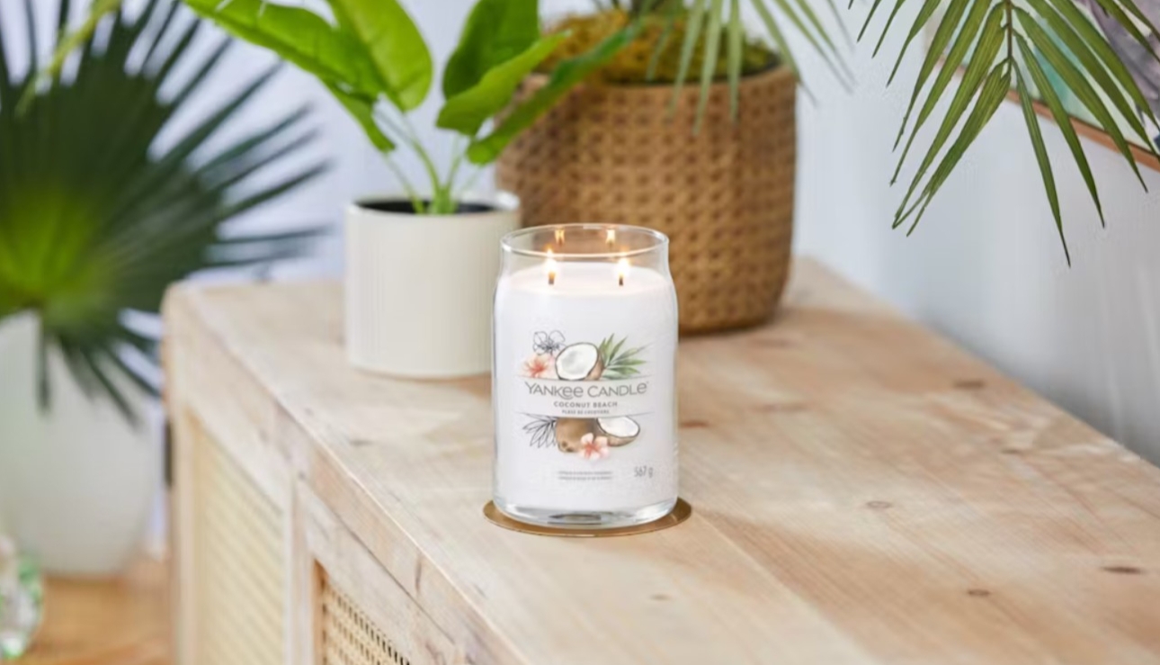 large yankee candle coconut on table