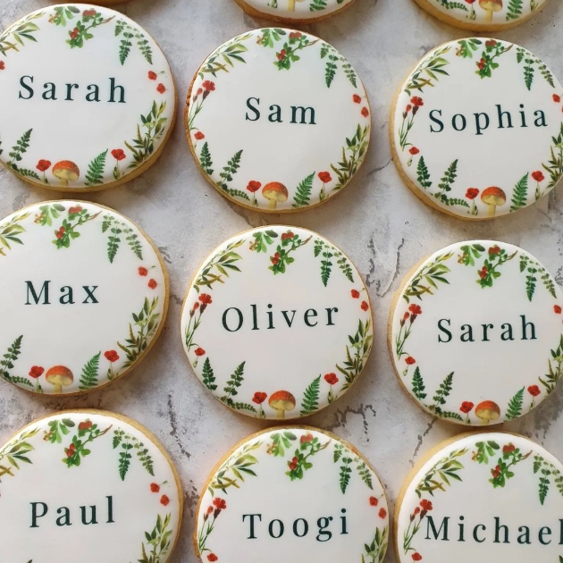 cookies iced and printed with wedding guests' names