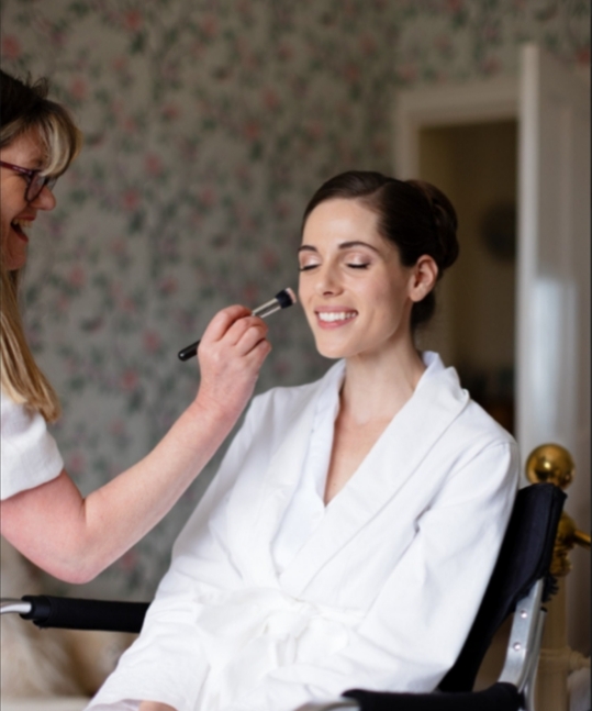 Bride having her makeup done