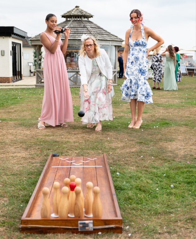 group of women playing skittles at a wedding