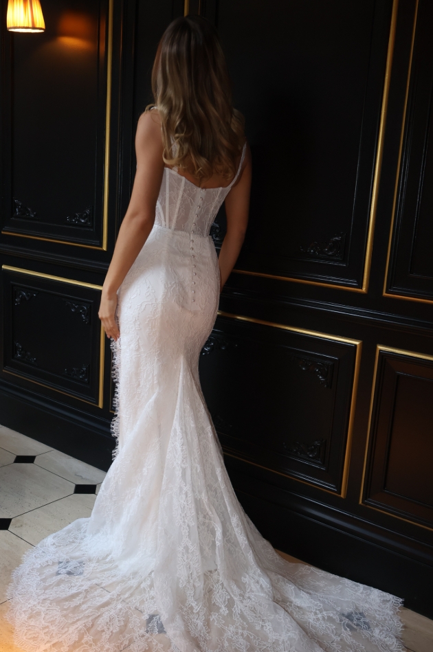 model in a lace fishtail dress