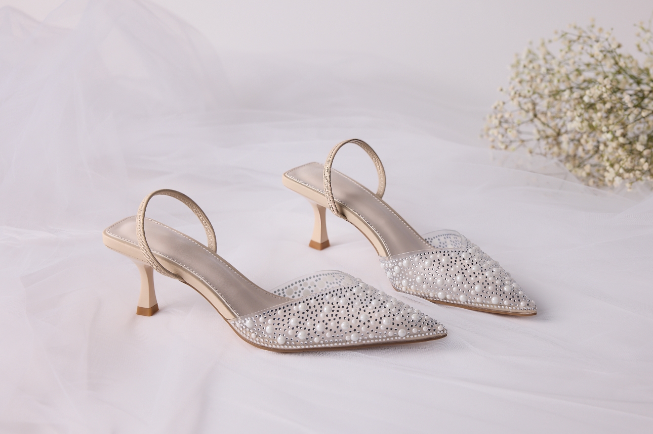 A pair of pearl beaded Deichmann bridal shoes