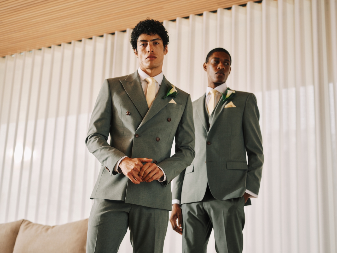 two male models in suits